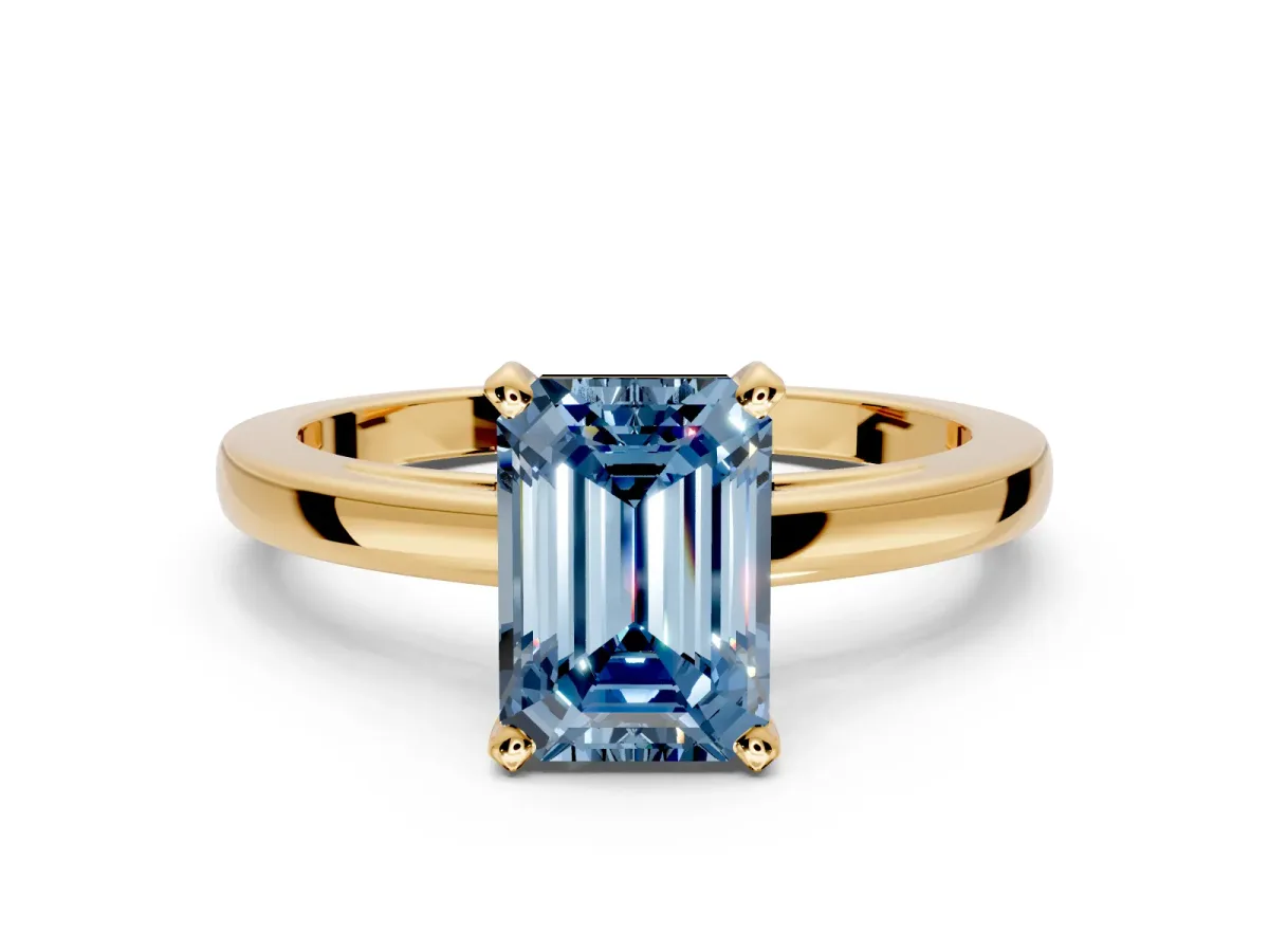 Solitaire Engagement Ring Setting for Fancy Blue Emerald Cut Center with Basket Rail and Prong Head in Yellow Gold