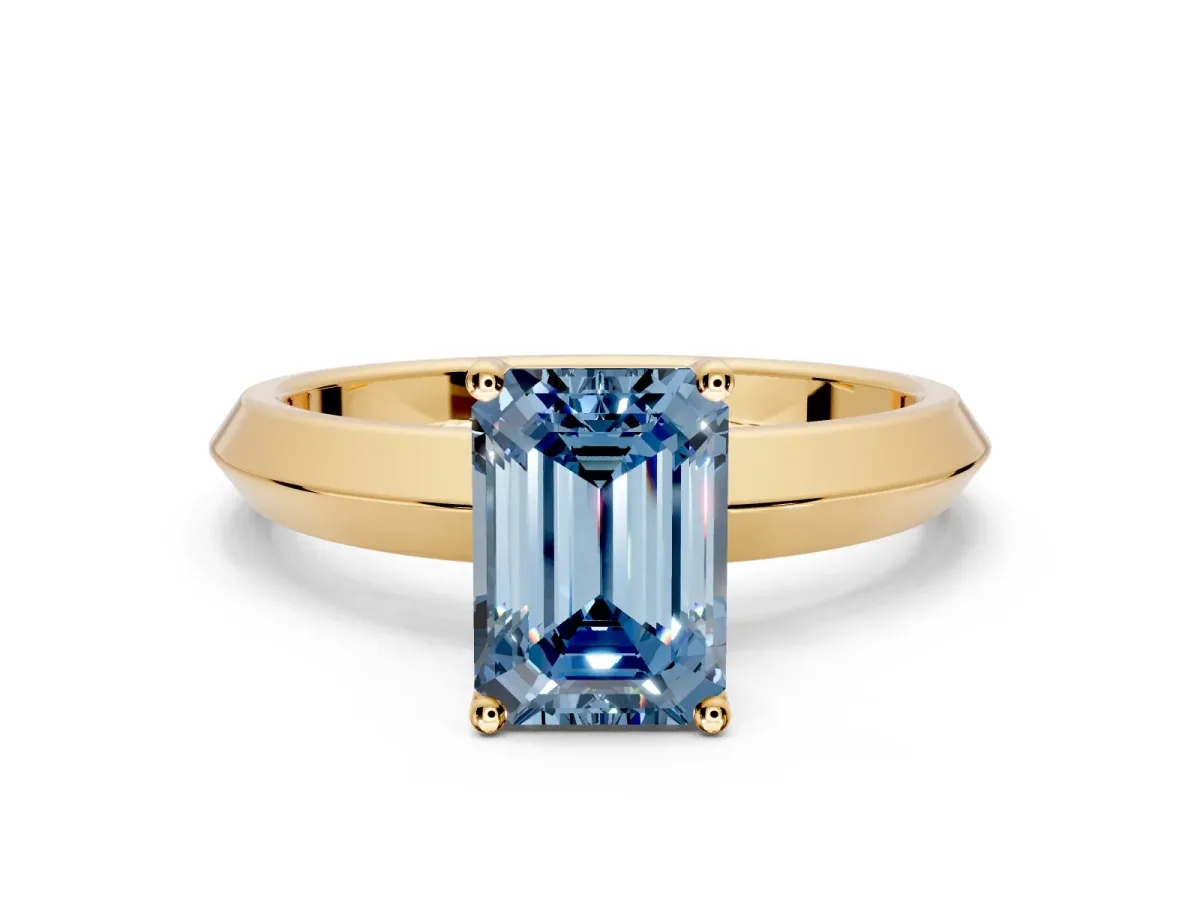 Solitaire Engagement Ring Setting for Fancy Blue Emerald Cut Center with Wide Knife Ridge Band and Prong Head in Yellow Gold