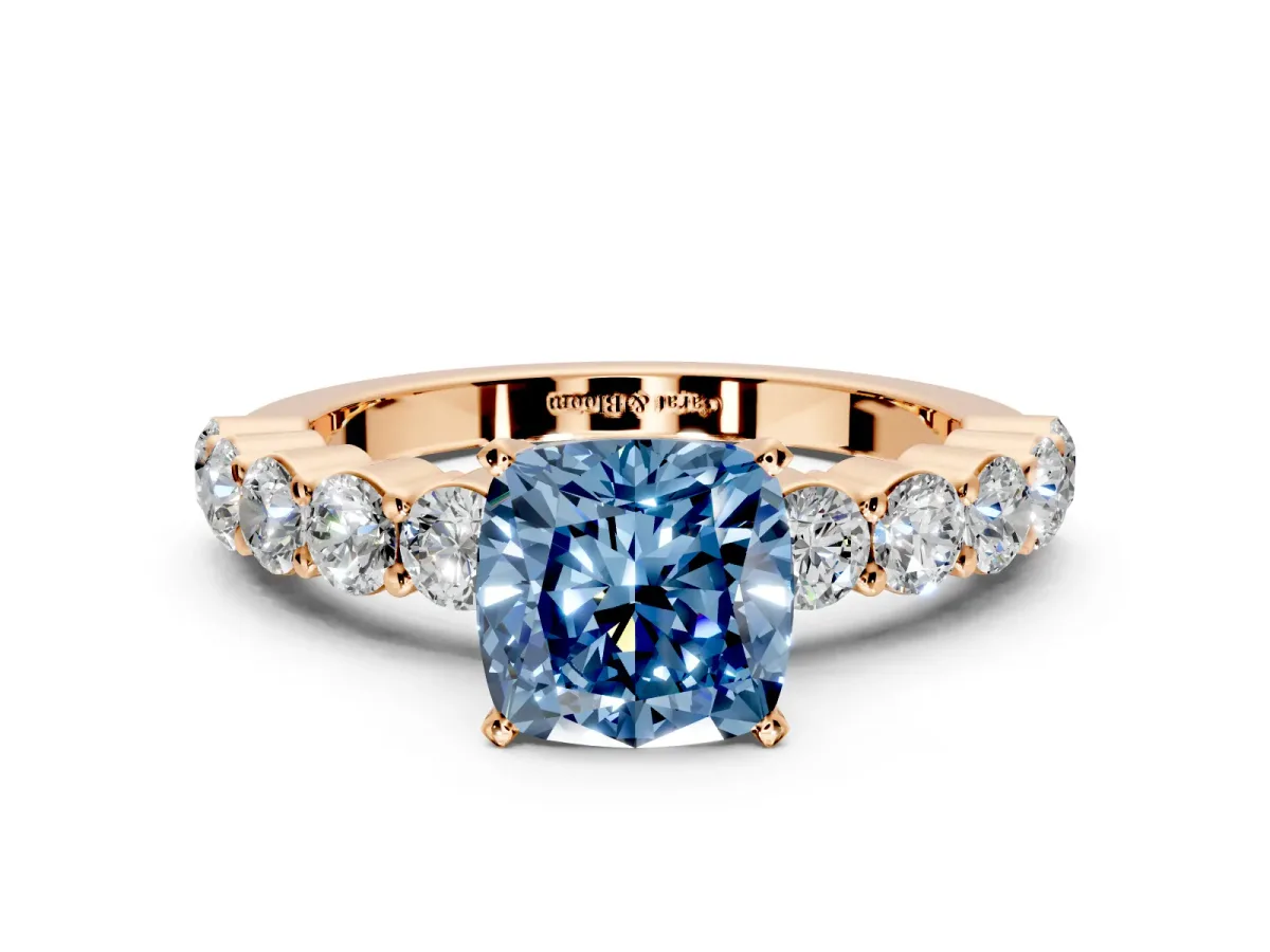 Shared-Prong Engagement Ring Setting for Fancy Blue Cushion Cut Center with Graduated Accents and Prong Head in Rose Gold