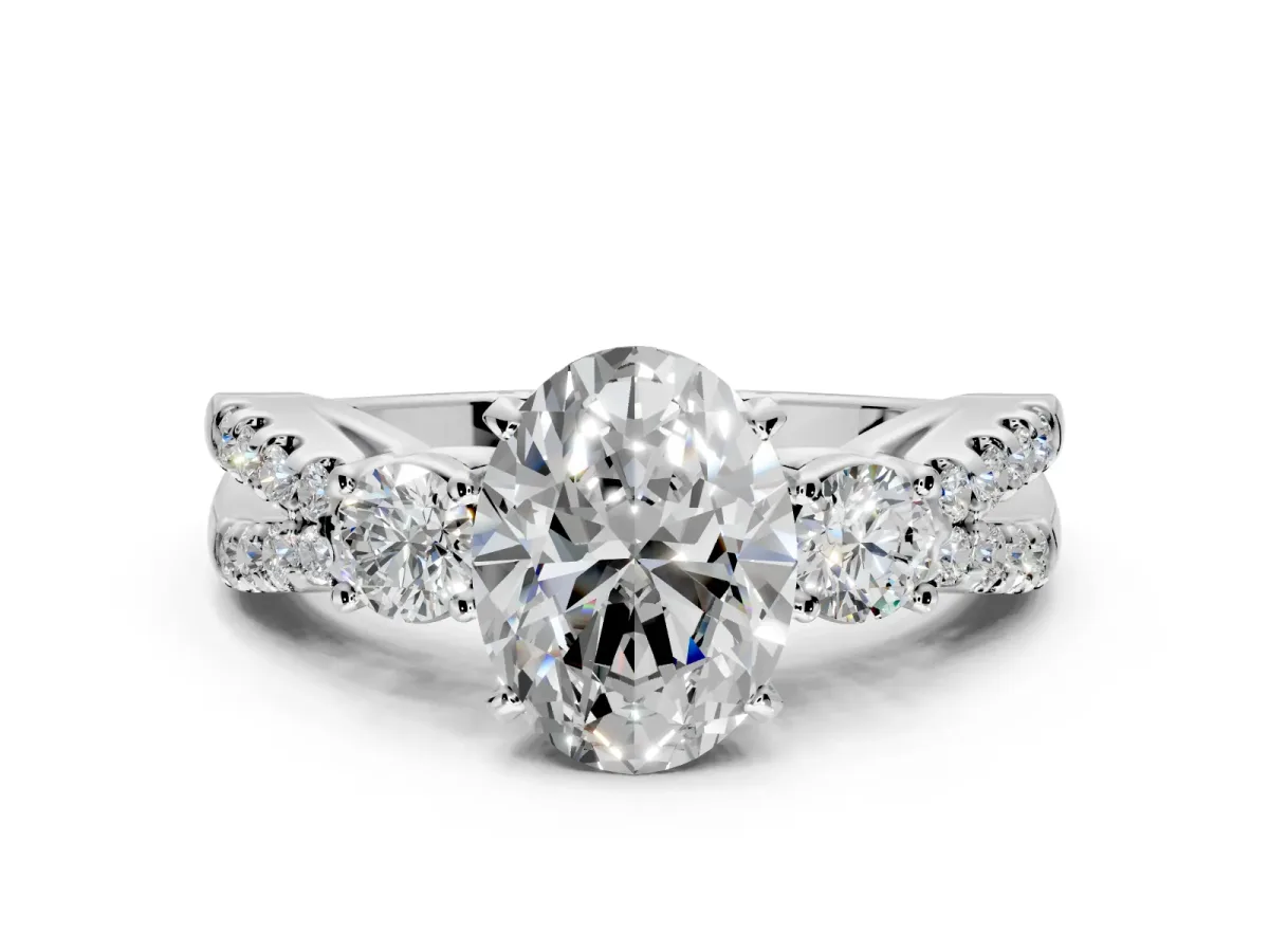 3 Stone Engagement Ring Setting for Oval Center with Pave Split Shank and Prong Head in Platinum