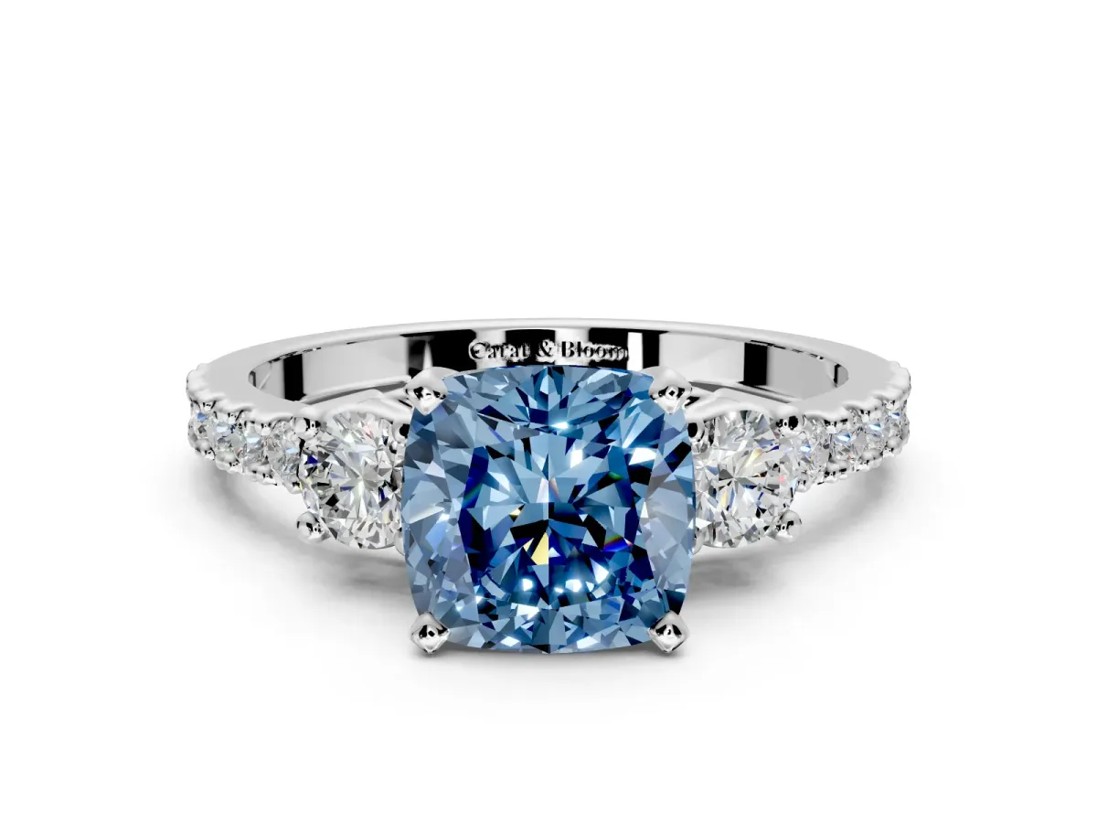 3 Stone Engagement Ring Setting for Fancy Blue Cushion Cut Center with Round Cut Side Accents and Prong Head in White Gold