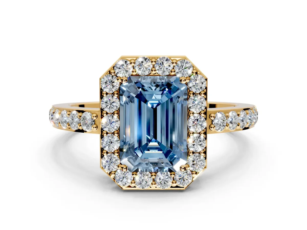 Halo Engagement Ring Setting for Fancy Blue Emerald Cut Center with Heart-Shaped Openwork, Pave Band and Prong Head in Yellow Gold