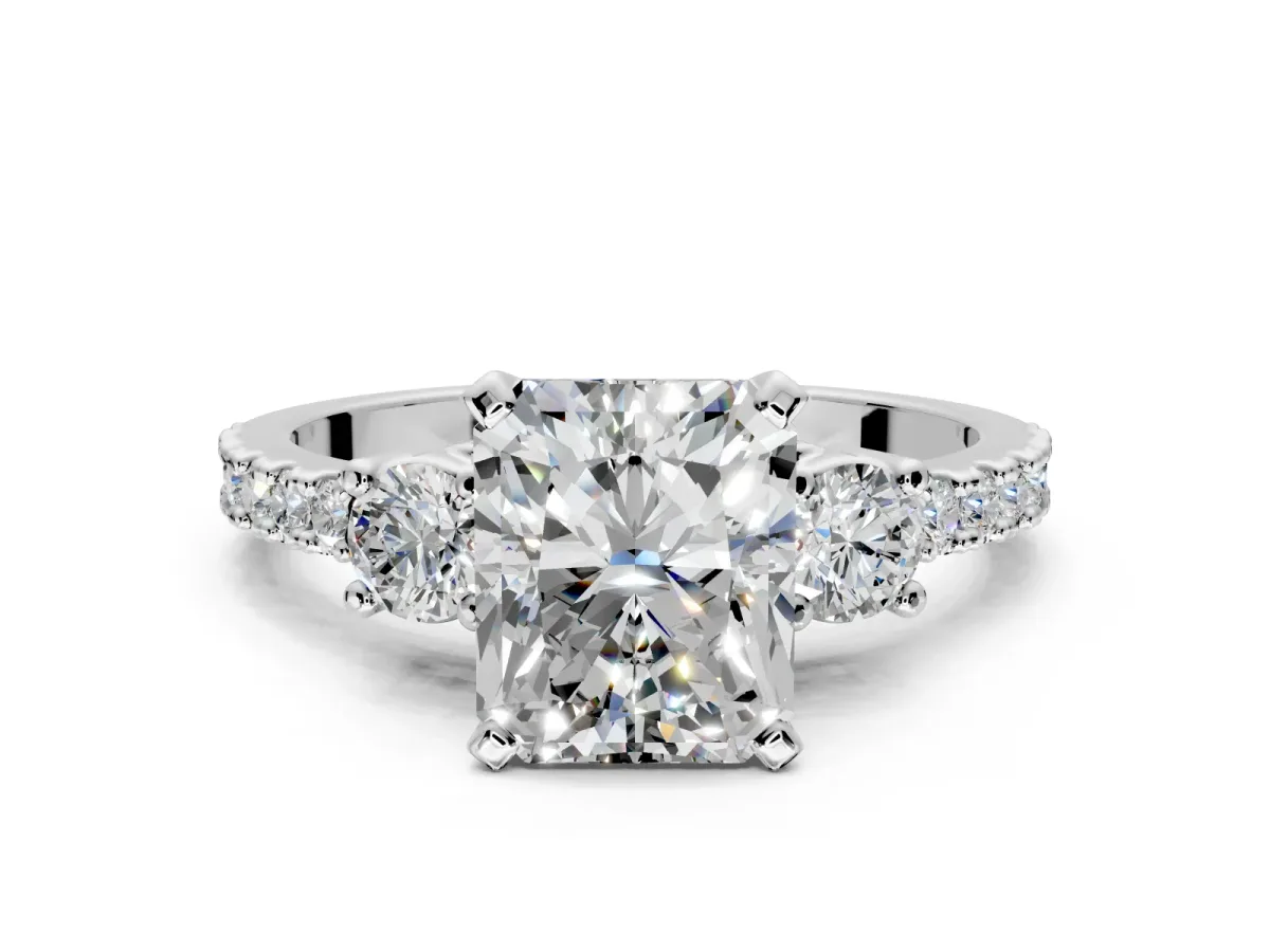 3 Stone Engagement Ring Setting for Radiant Cut Center with Round Cut Side Accents and Prong Head in Platinum