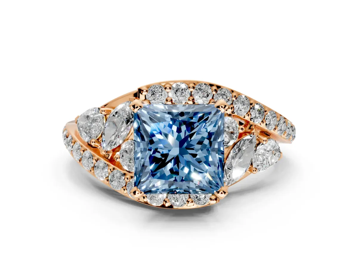 Halo Engagement Ring Setting for Fancy Blue Princess Cut Center with Marquise and Pave Bypass Band and Prong Head in Rose Gold
