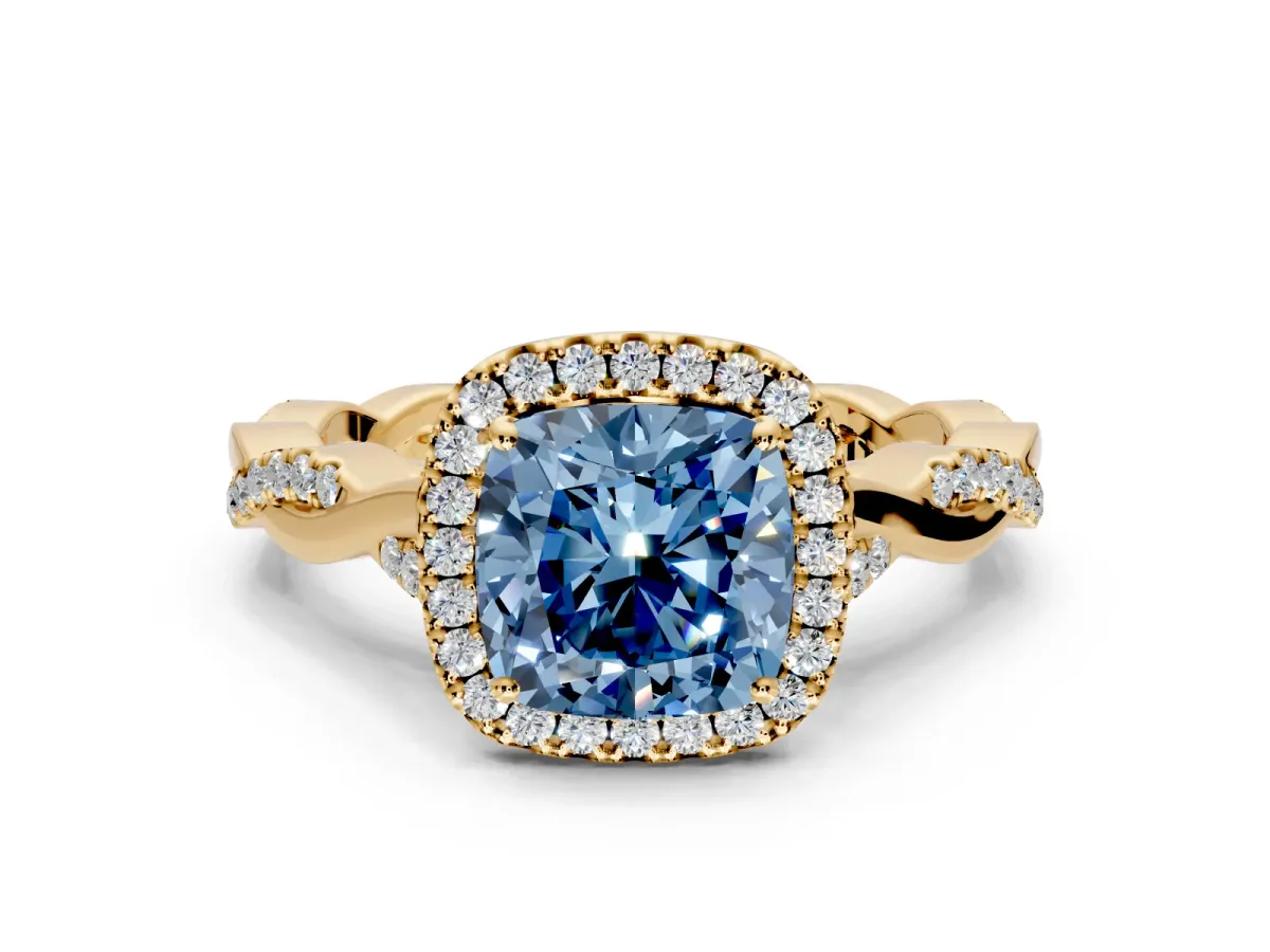 Halo Engagement Ring Setting for Fancy Blue Cushion Cut Center with Twist Band and Prong Head in Yellow Gold