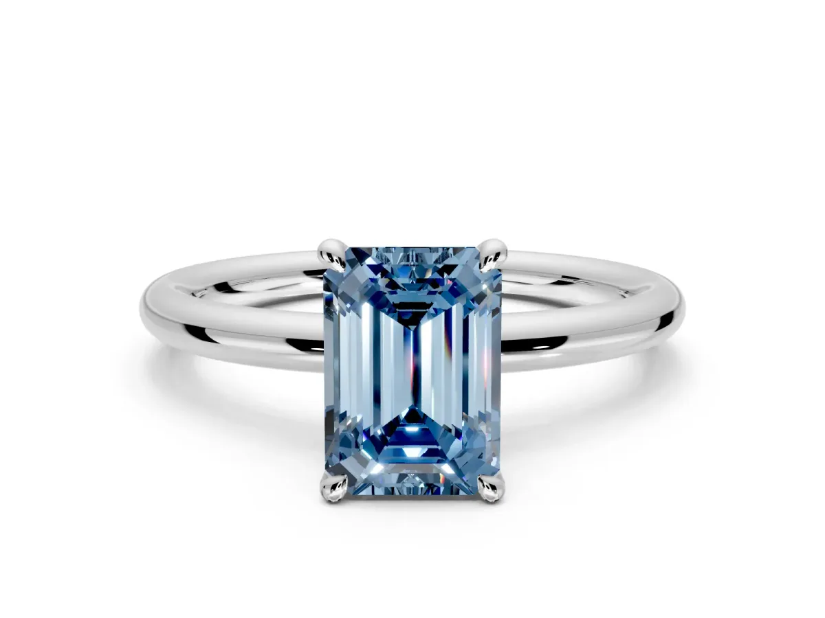 Hidden Halo Engagement Ring Setting for Fancy Blue Emerald Cut Center with Thin Rounded Band and Prong Head in Platinum