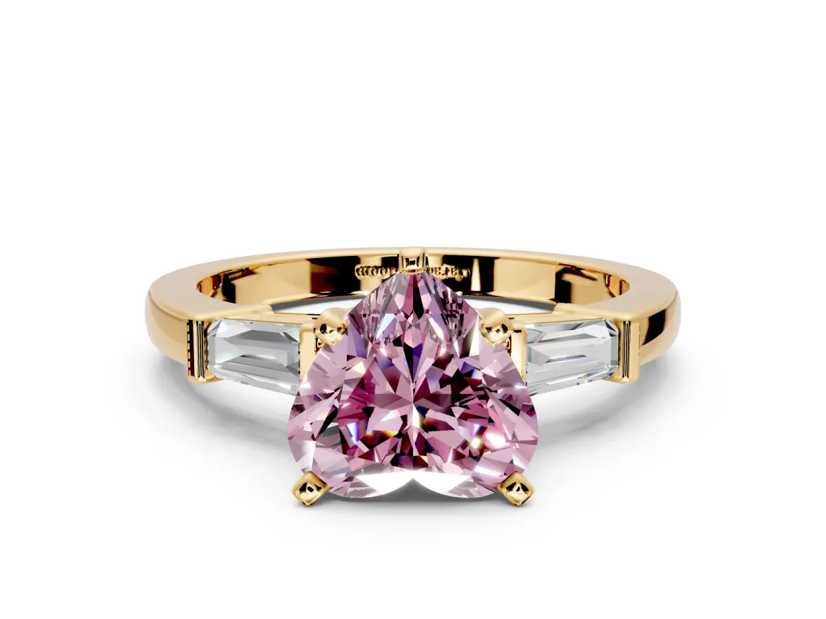 3 Stone Engagement Ring Setting for Fancy Pink Heart-Shaped Center with Channel Baguette Accents and Prong Head in Yellow Gold