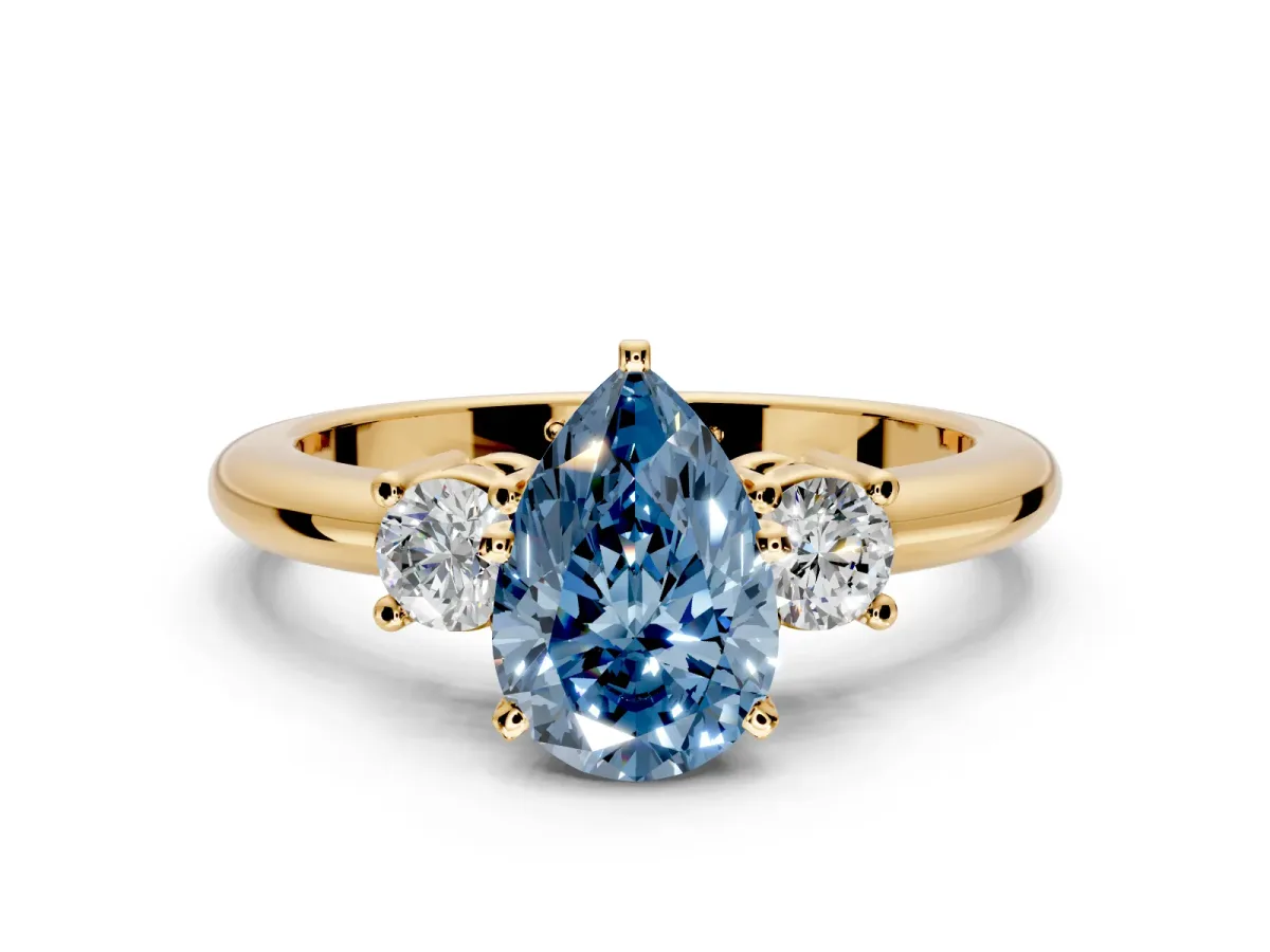 3 Stone Engagement Ring Setting for Fancy Blue Pear-Shaped Center with Wide Plain Band and Prong Head in Yellow Gold