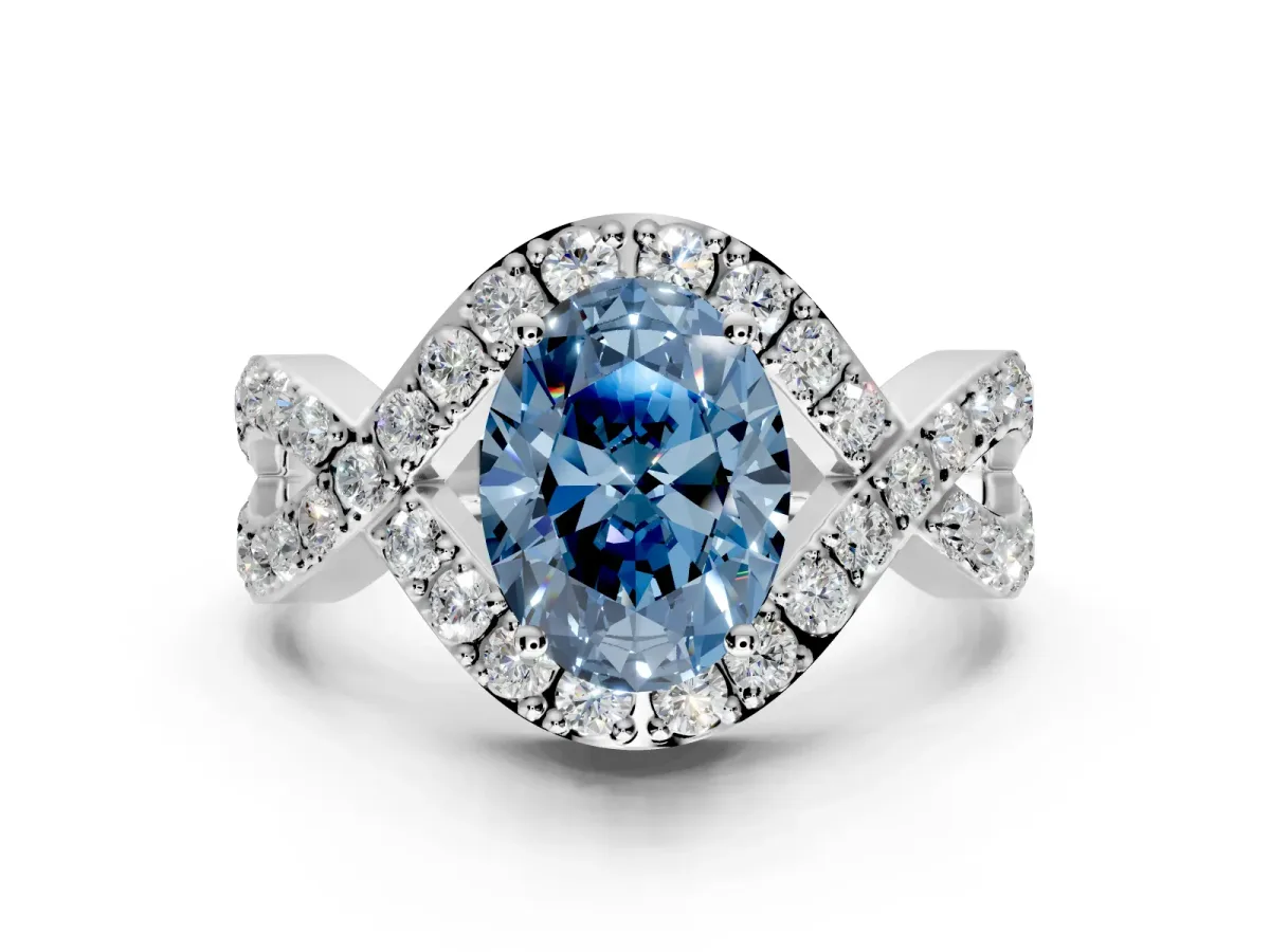 Halo Engagement Ring Setting for Fancy Blue Oval Center with Pave Infinity Twist Band and Prong Head in Platinum