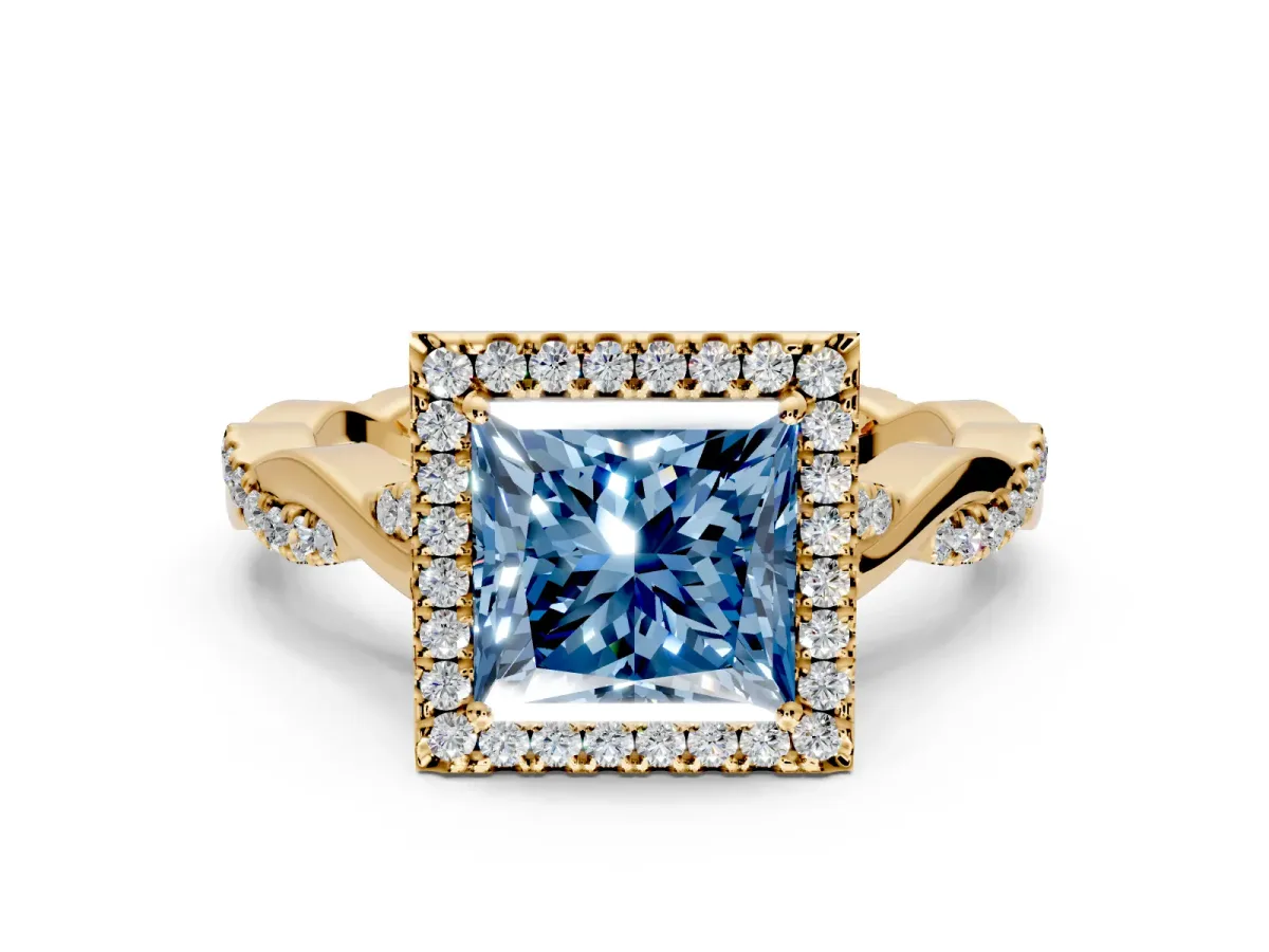 Halo Engagement Ring Setting for Fancy Blue Princess Cut Center with Twist Band and Prong Head in Yellow Gold