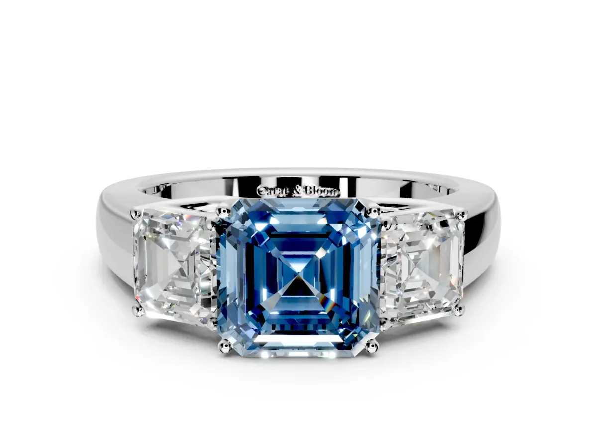 3 Stone Engagement Ring Setting for Fancy Blue Asscher Cut Center with Raised Basket Heads and Prong Head in Platinum