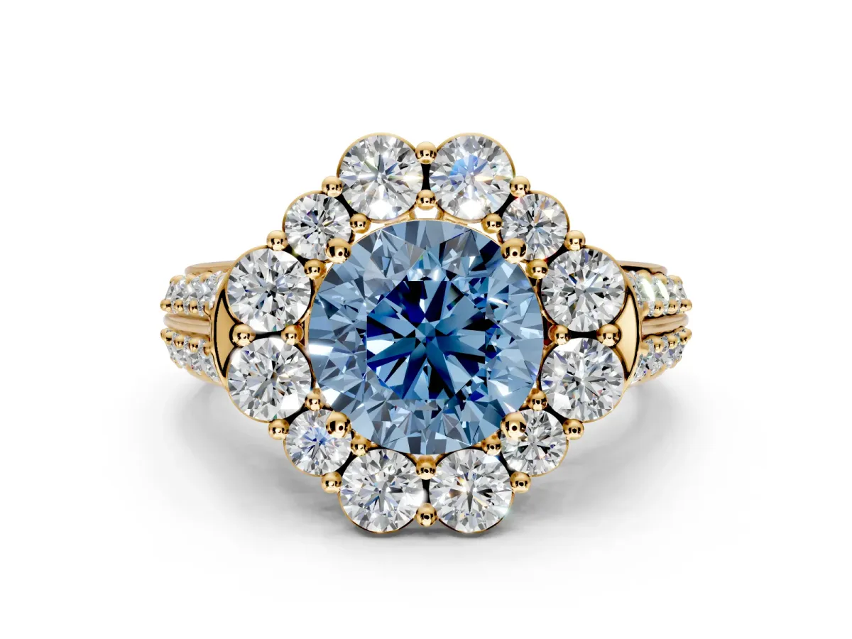 Large Accent Halo Engagement Ring Setting for Fancy Blue Round Cut Center with Pave Split Shank and Prong Head in Yellow Gold