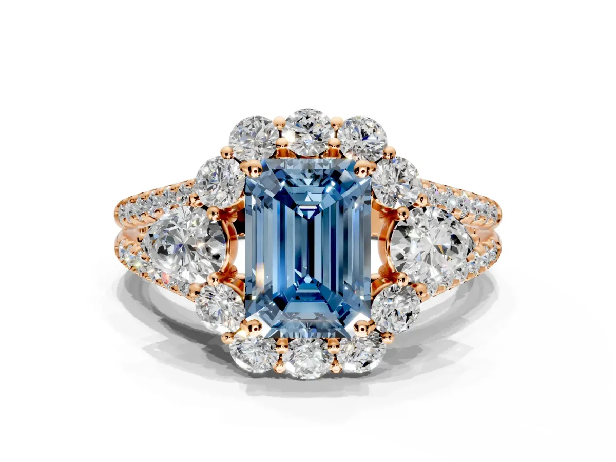 Halo Engagement Ring Setting for Fancy Blue Emerald Cut Center with Two-Strand Split Shank and Prong Head in Rose Gold