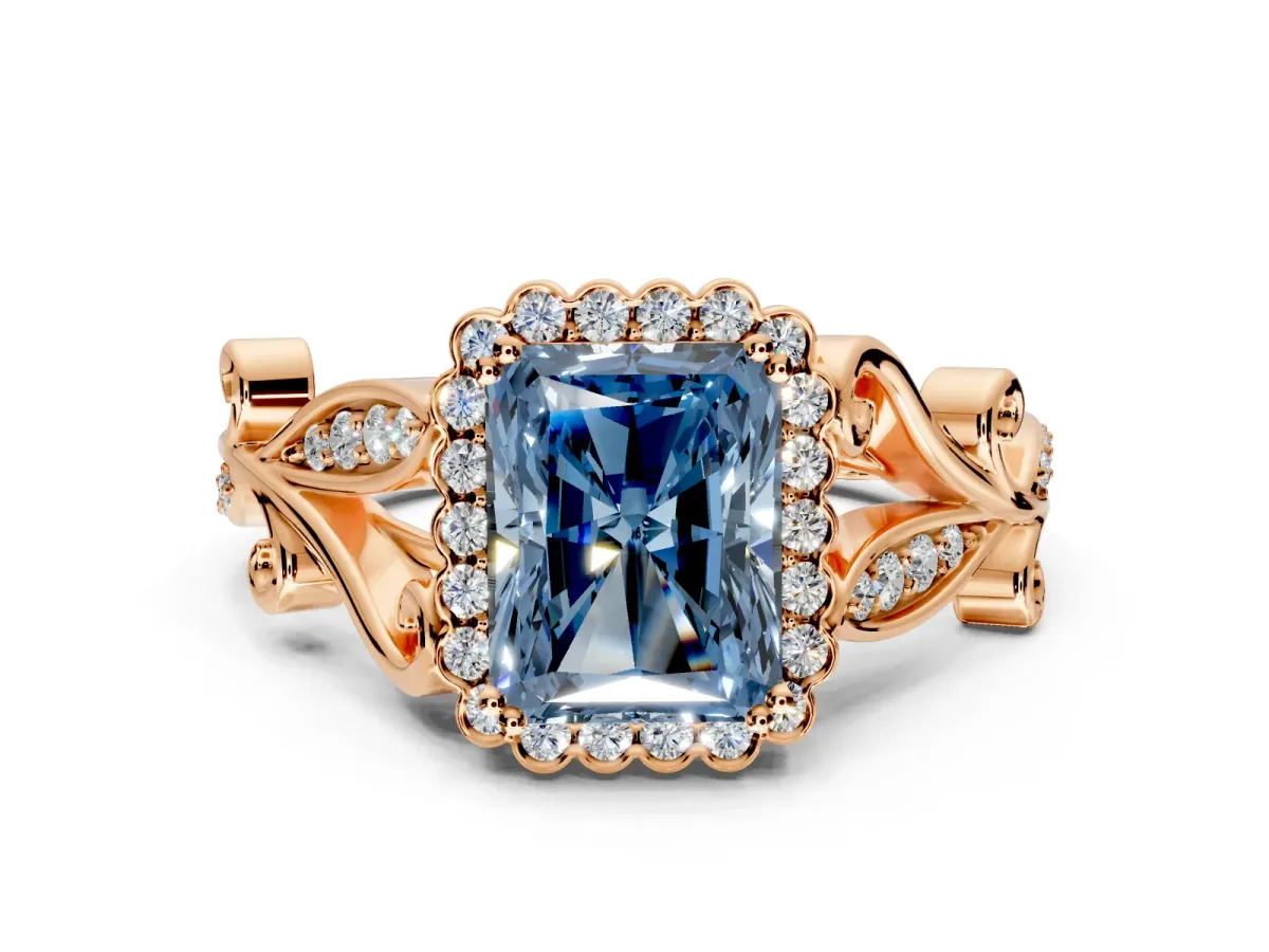 Halo Engagement Ring Setting for Fancy Blue Radiant Cut Center with Leaf Motif Split Shank and Prong Head in Rose Gold