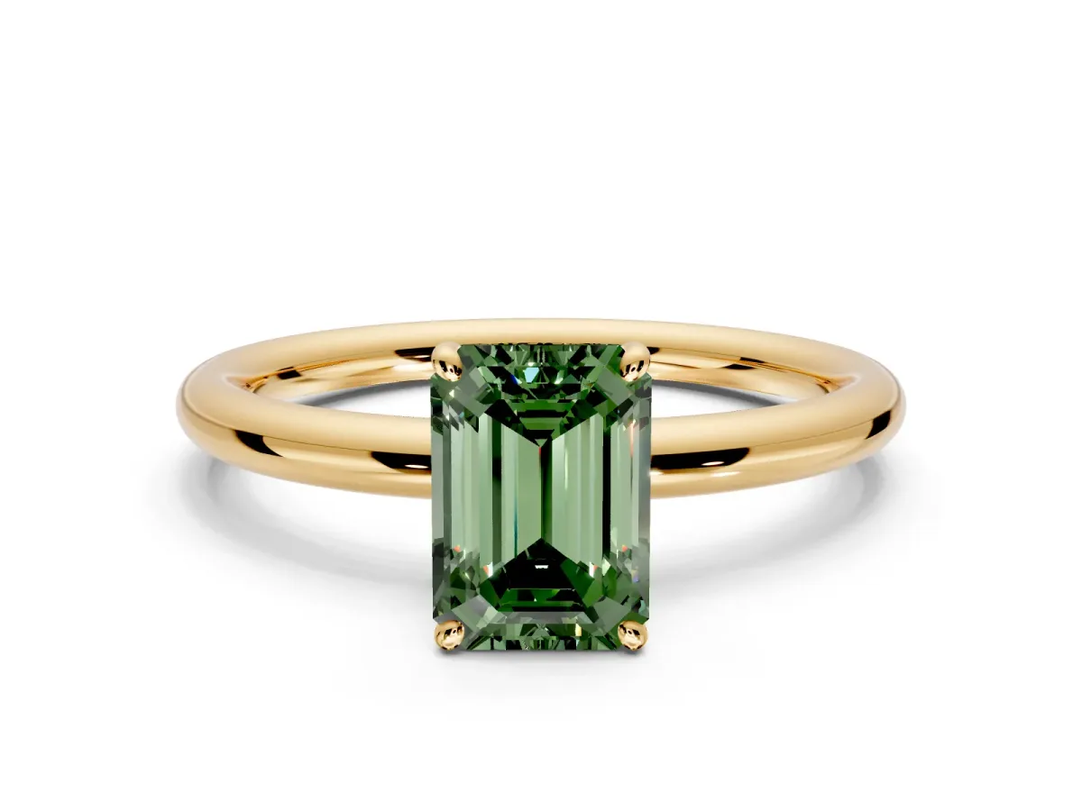 Low-Set Solitaire Engagement Ring Setting for Fancy Green Emerald Cut Center with Thin Plain Band and Prong Head in Yellow Gold