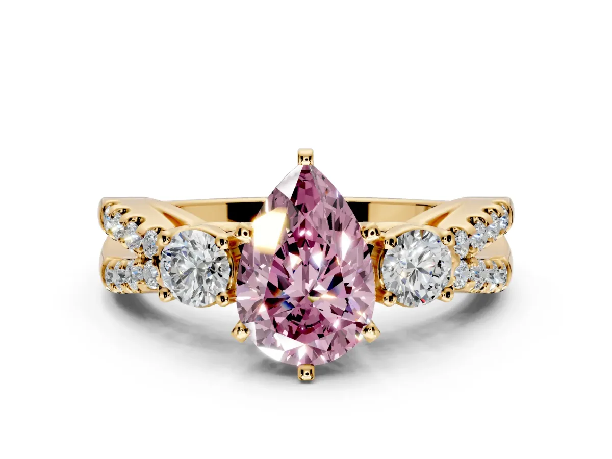 3 Stone Engagement Ring Setting for Fancy Pink Pear-Shaped Center with Pave Split Shank and Prong Head in Yellow Gold