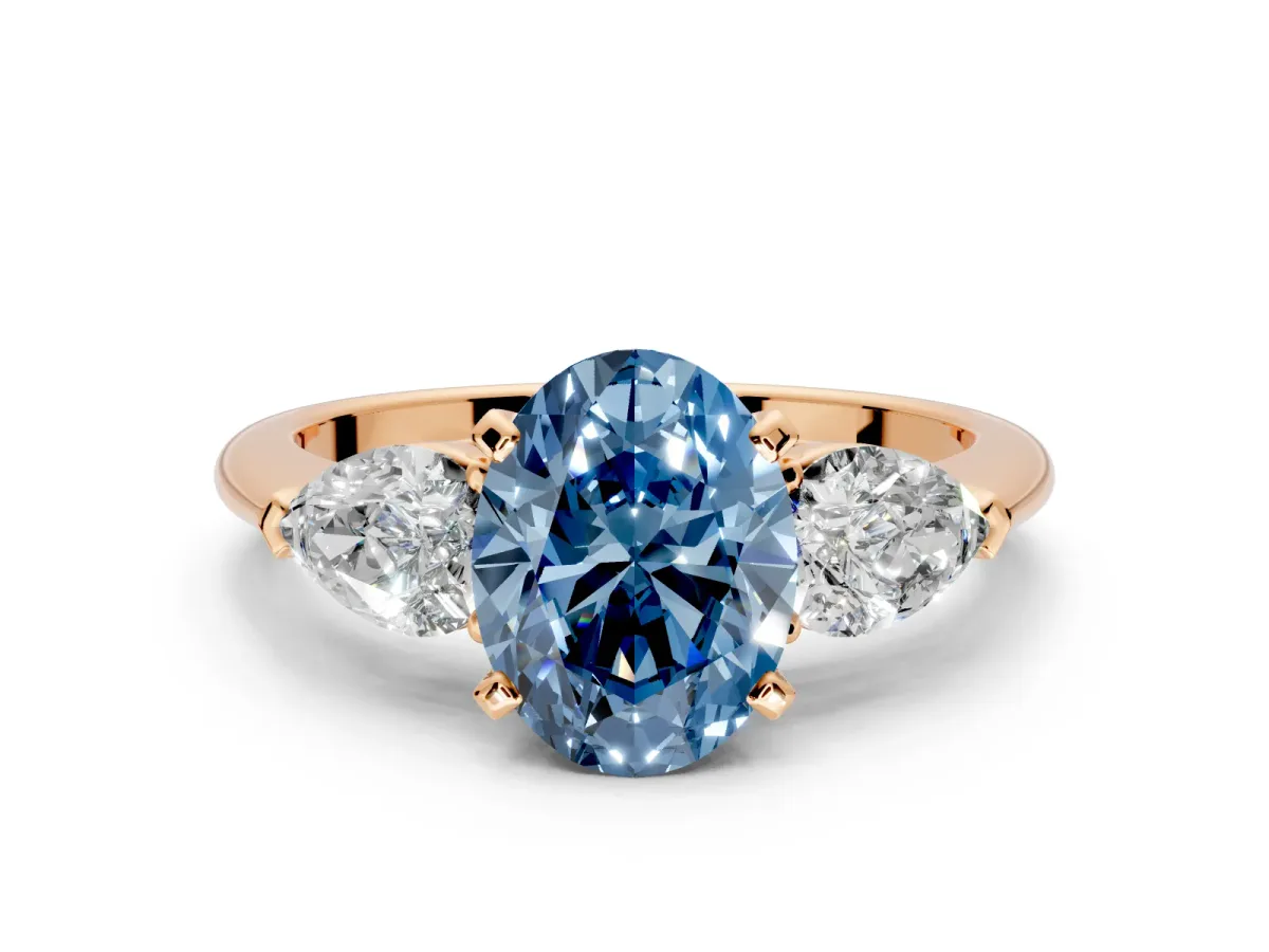 3 Stone Engagement Ring Setting for Fancy Blue Oval Center with Large Pear-Shaped Accents and Prong Head in Rose Gold