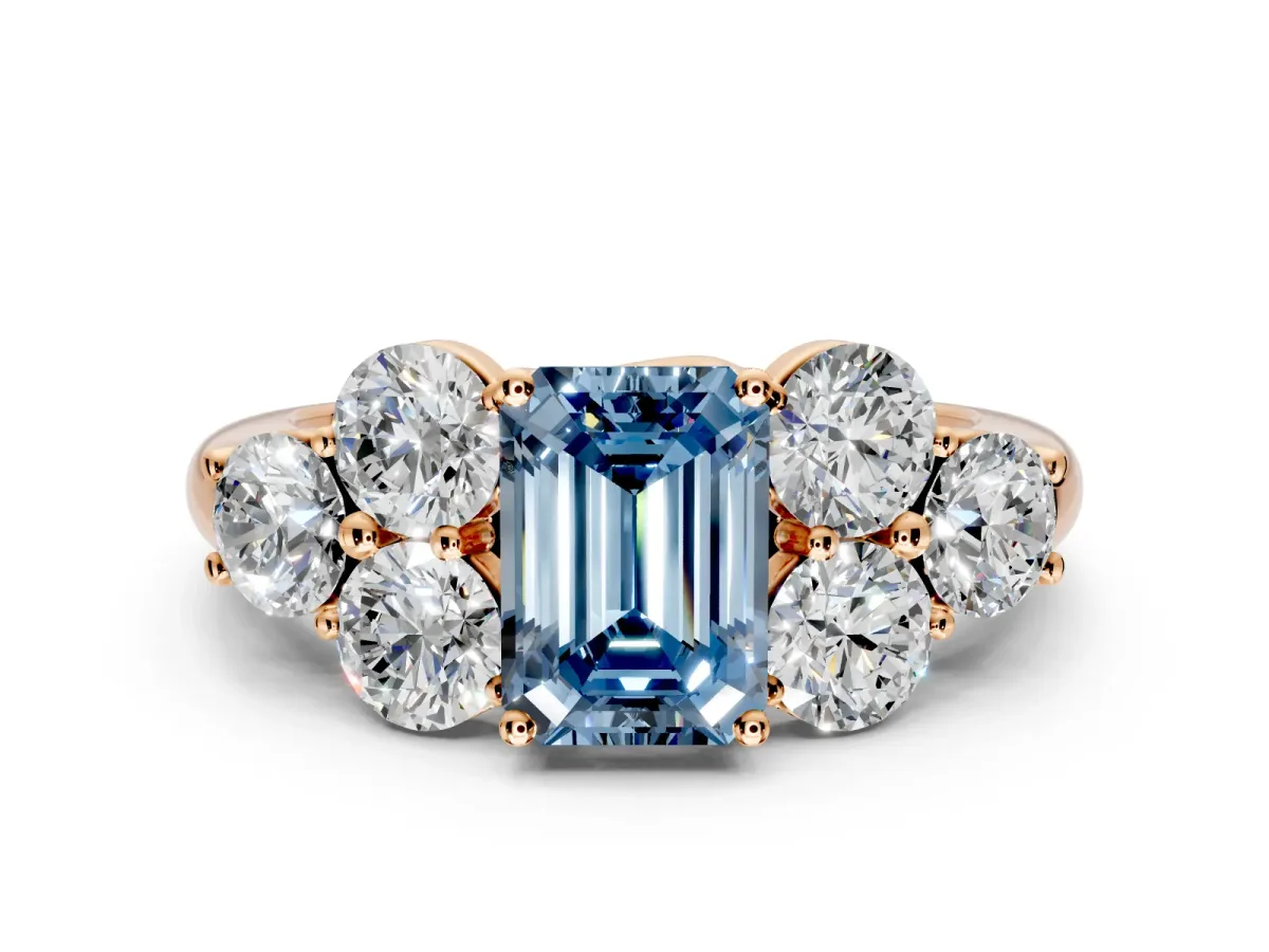 Cluster Engagement Ring Setting for Fancy Blue Emerald Cut Center with Round Cut Accent Frame and Prong Head in Rose Gold