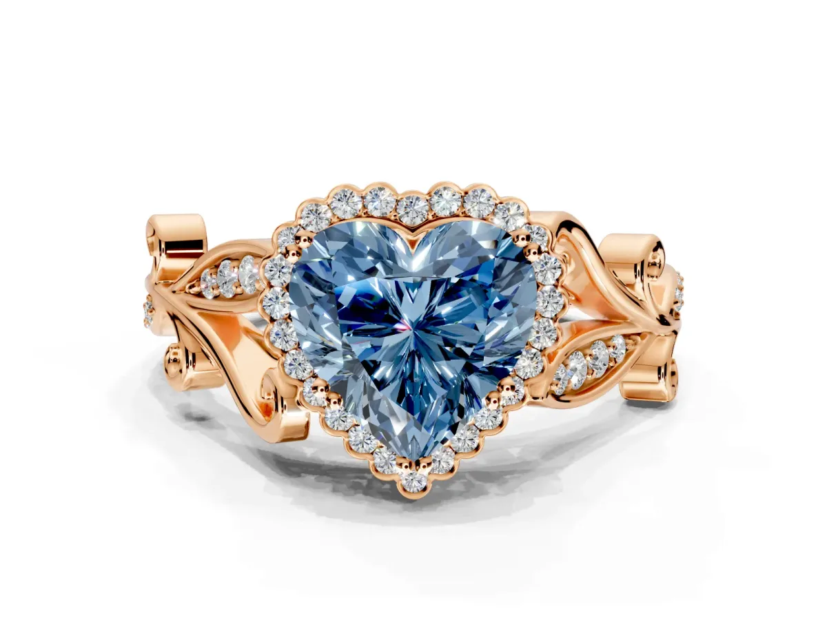 Halo Engagement Ring Setting for Fancy Blue Heart-Shaped Center with Leaf Motif Split Shank and Prong Head in Rose Gold