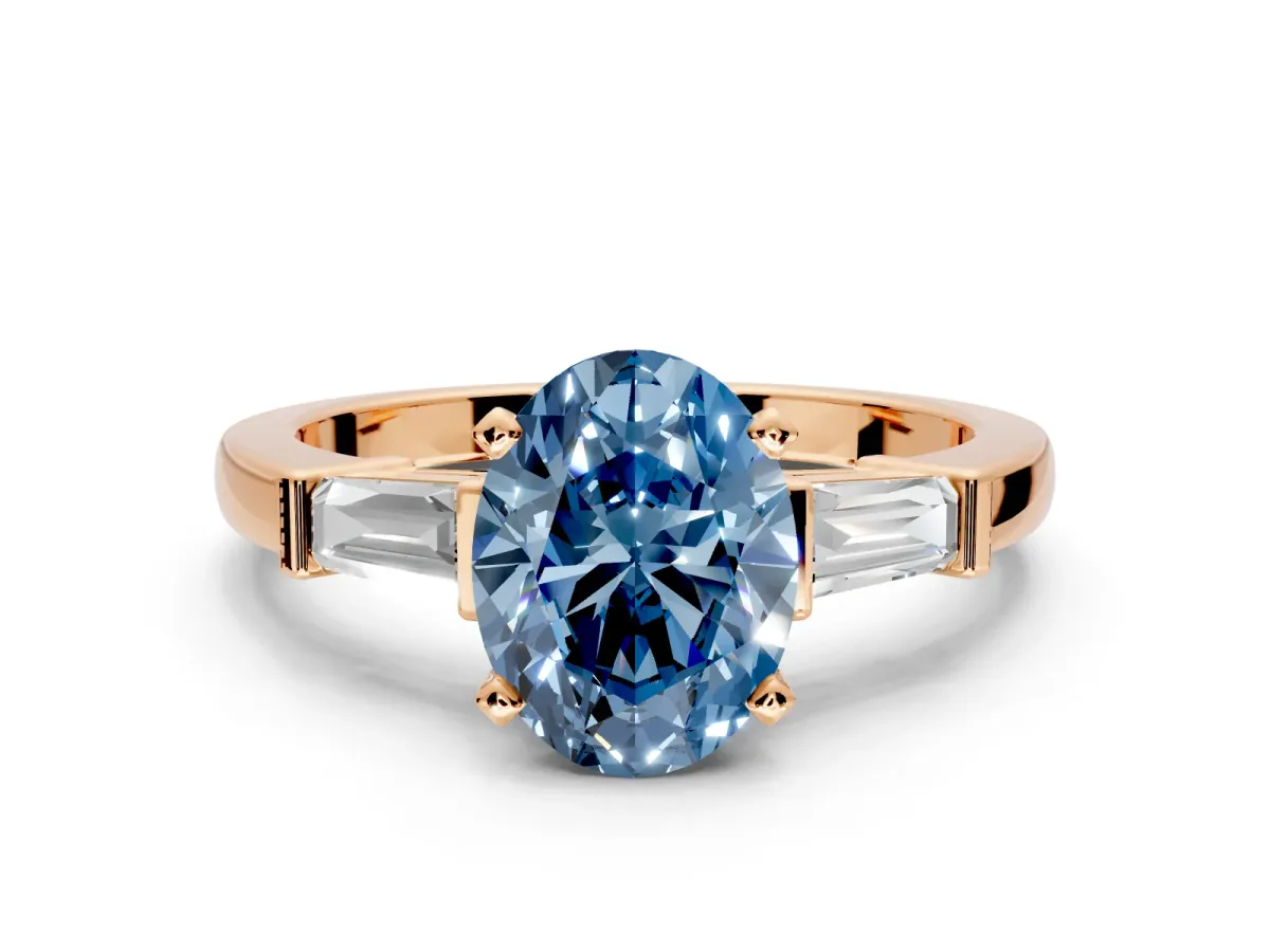 3 Stone Engagement Ring Setting for Fancy Blue Oval Center with Channel Baguette Accents and Prong Head in Rose Gold