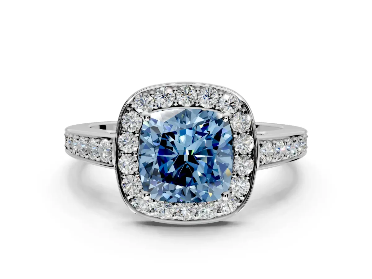 Bezel-Framed Halo Engagement Ring Setting for Fancy Blue Cushion Cut Center with Pave Band and Prong Head in Platinum