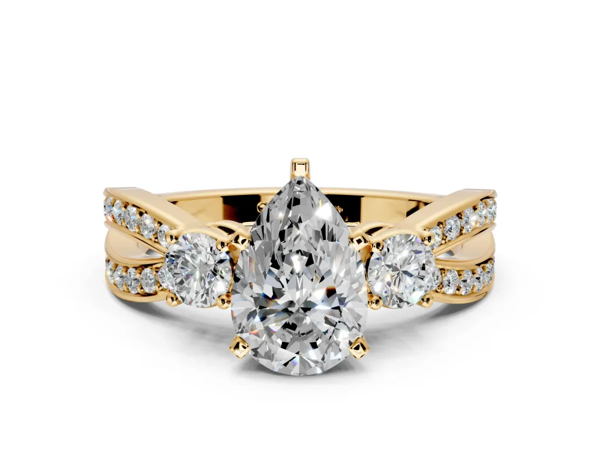 3 Stone Engagement Ring Setting for Pear-Shaped Center with Pave Twist Band and Prong Head in Yellow Gold