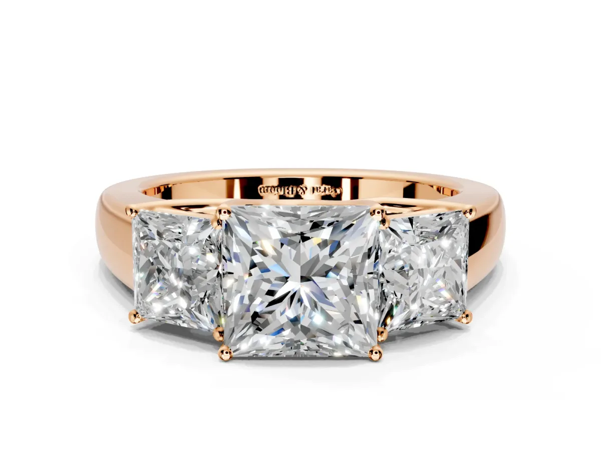 3 Stone Engagement Ring Setting for Princess Cut Center with Raised Basket Heads and Prong Head in Rose Gold