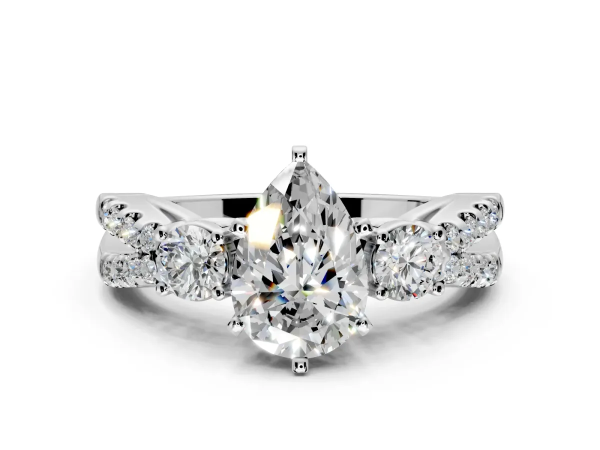 3 Stone Engagement Ring Setting for Pear-Shaped Center with Pave Split Shank and Prong Head in Platinum