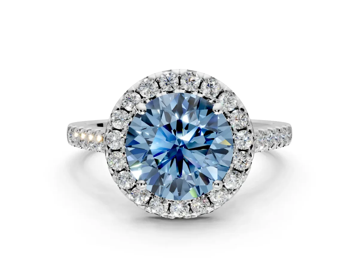 Halo Engagement Ring Setting for Fancy Blue Round Cut Center with Narrowing Pave Band and Prong Head in White Gold