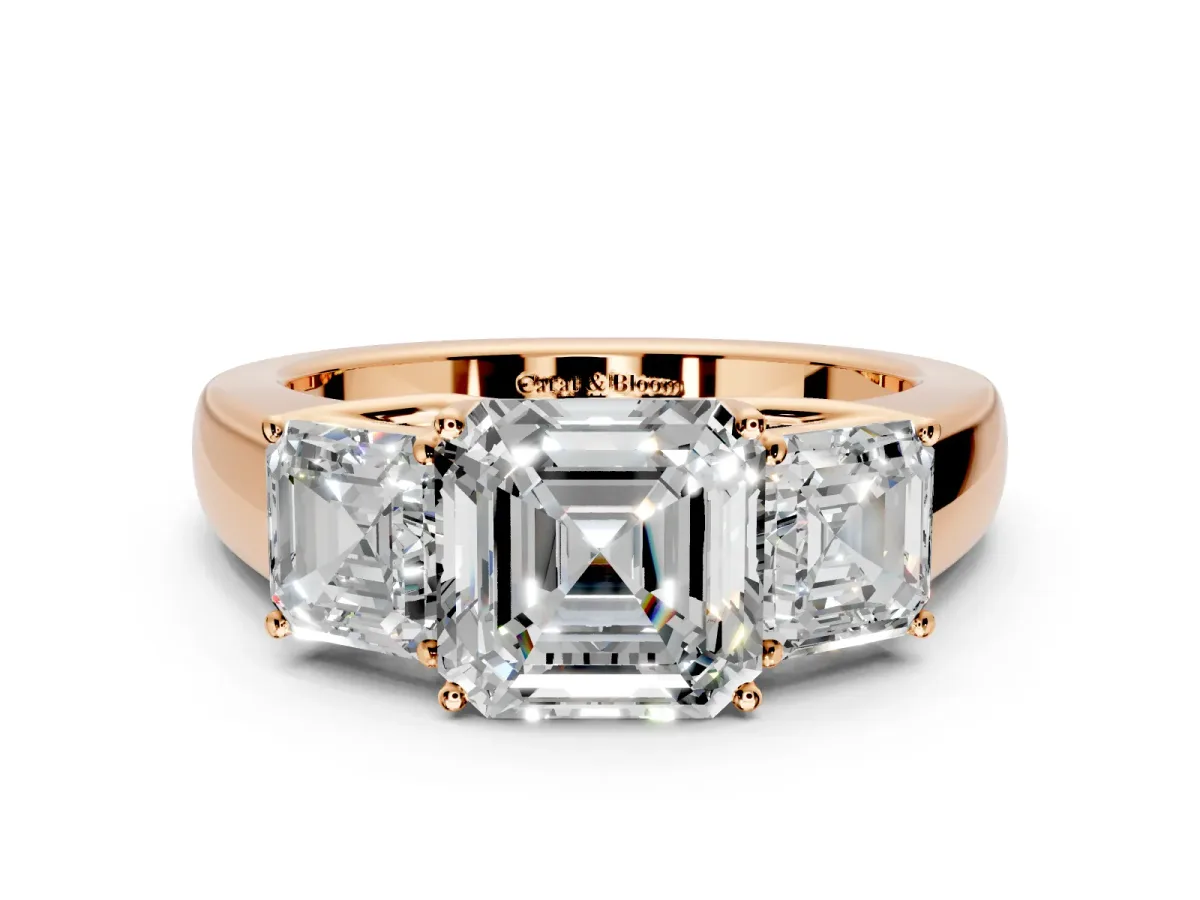 3 Stone Engagement Ring Setting for Asscher Cut Center with Raised Basket Heads and Prong Head in Rose Gold