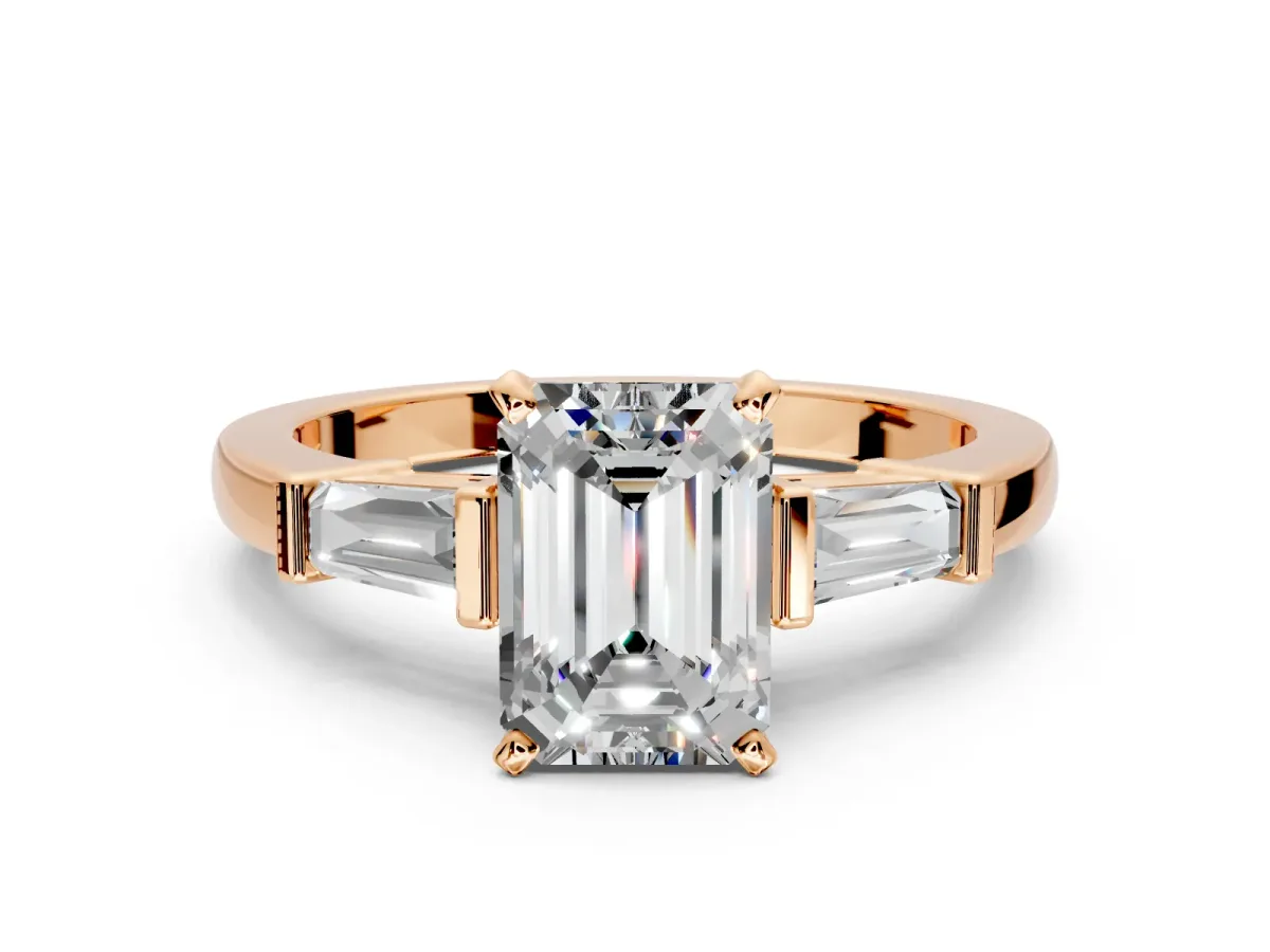 3 Stone Engagement Ring Setting for Emerald Cut Center with Channel Baguette Accents and Prong Head in Rose Gold