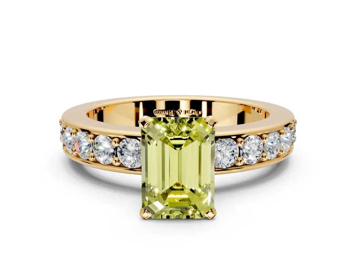 Solitaire Engagement Ring Setting for Fancy Yellow Emerald Cut Center with Channel-Set Accents and Prong Head in Yellow Gold