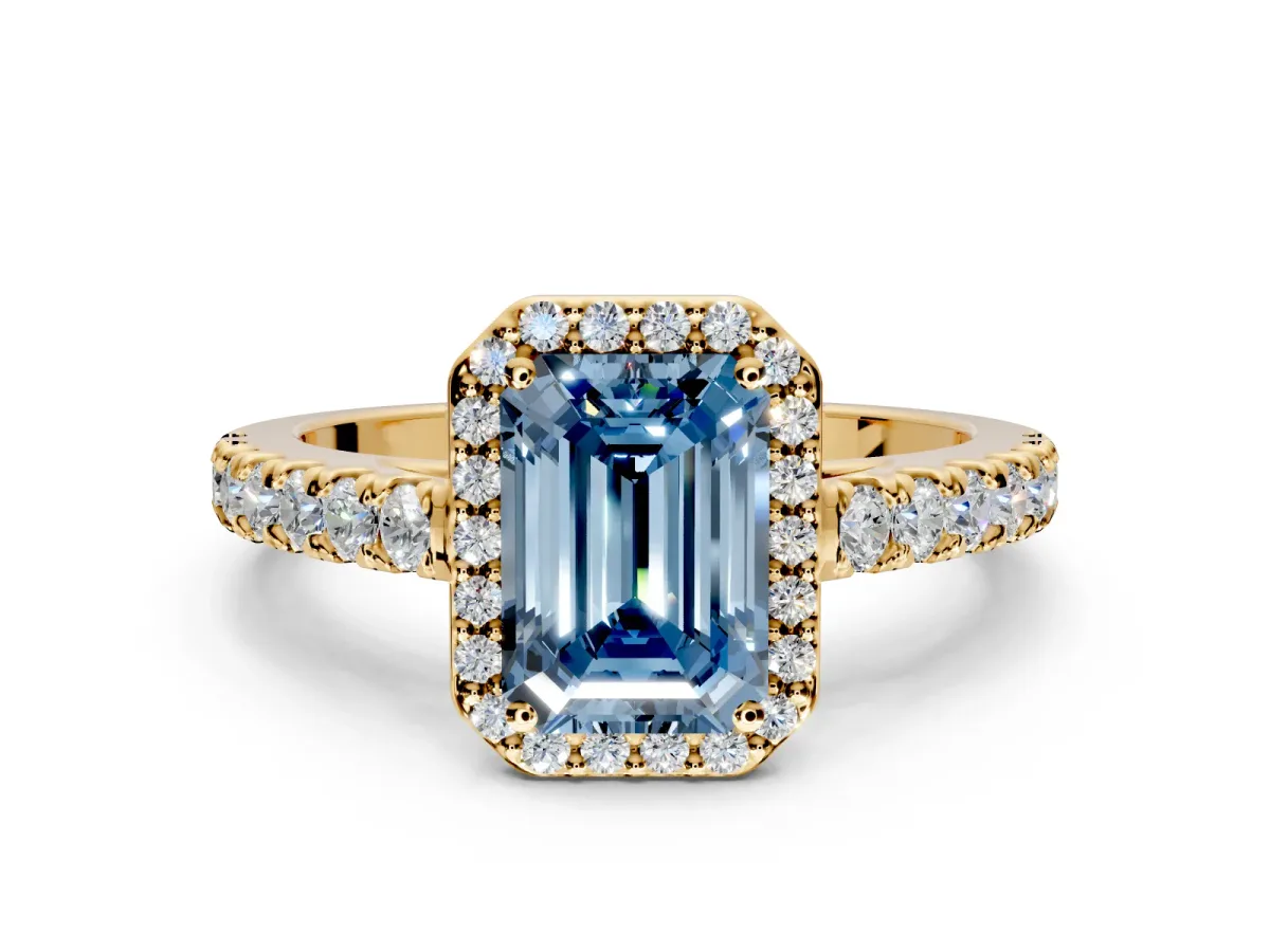 Halo Engagement Ring Setting for Fancy Blue Emerald Cut Center with Full Pave Band and Prong Head in Yellow Gold