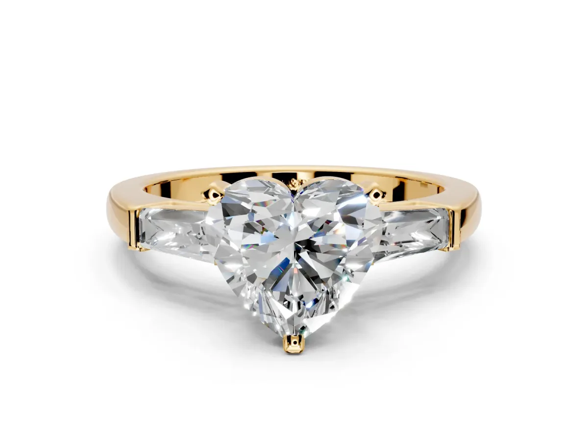 3 Stone Engagement Ring Setting for Heart-Shaped Center with Tapered Baguettes, Plain Band and Prong Head in Yellow Gold