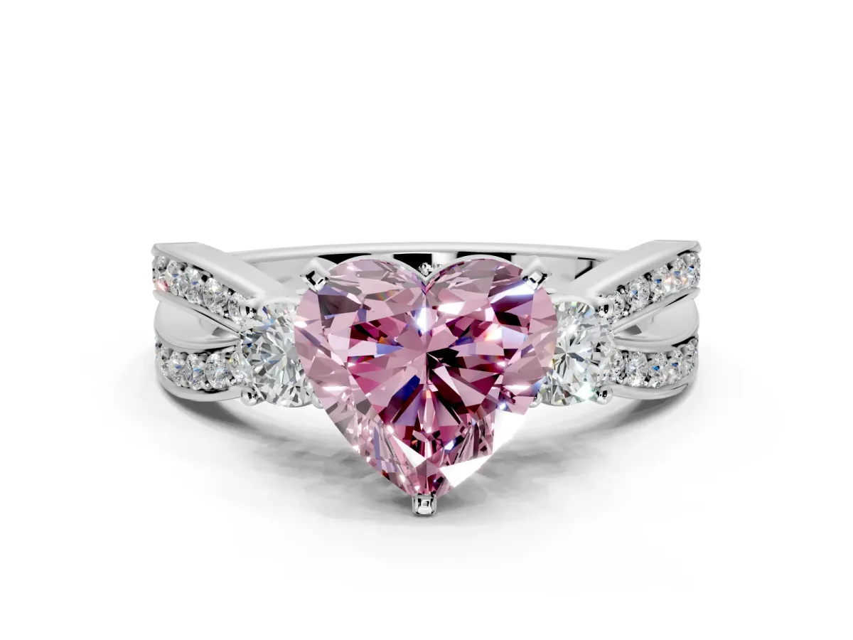 3 Stone Engagement Ring Setting for Fancy Pink Heart-Shaped Center with Pave Twist Band and Prong Head in Platinum