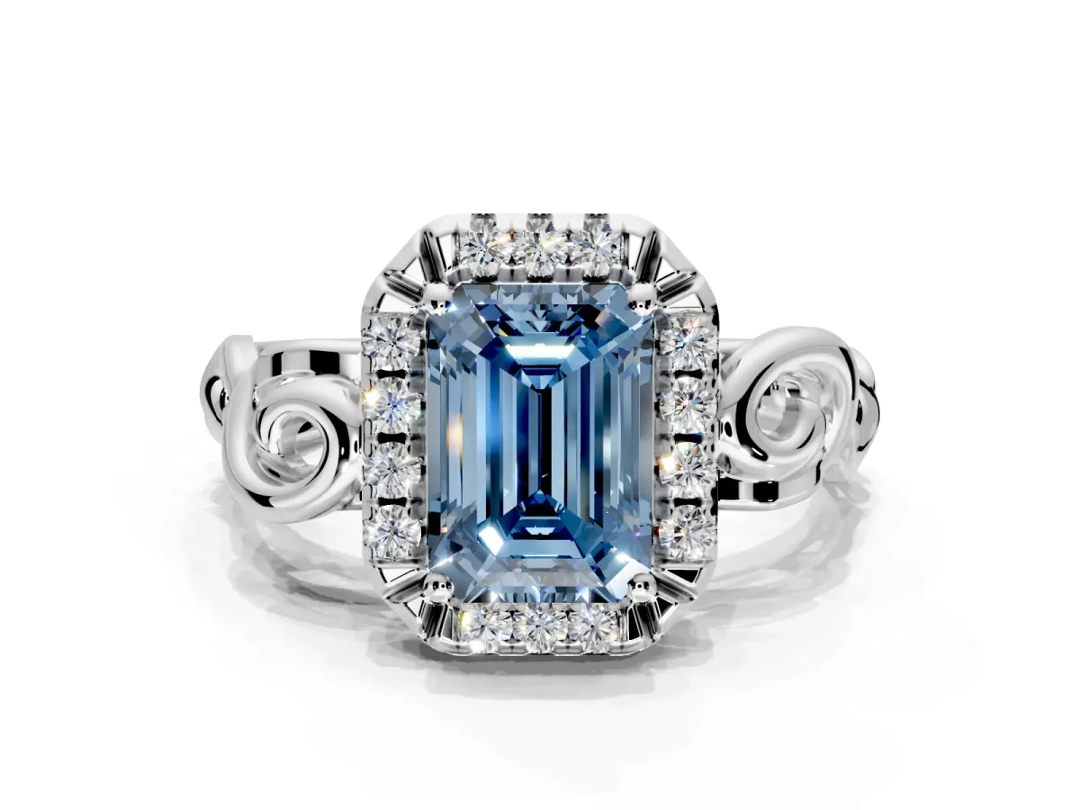 Halo Engagement Ring Setting for Fancy Blue Emerald Cut Center with Open Scroll Shoulders and Prong Head in Platinum