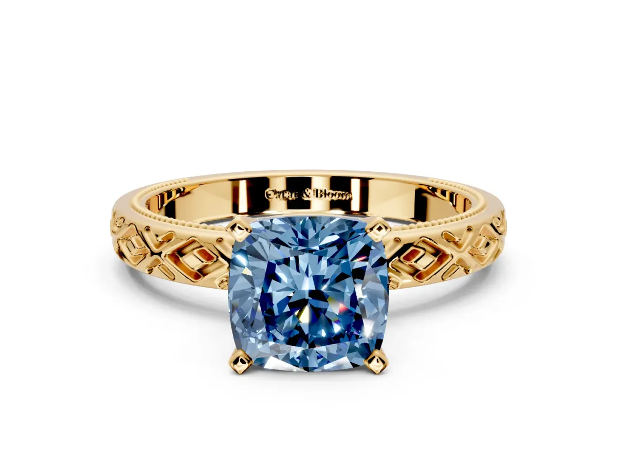 Solitaire Engagement Ring Setting for Fancy Blue Cushion Cut Center with Milgrain X Pattern Band and Prong Head in Yellow Gold