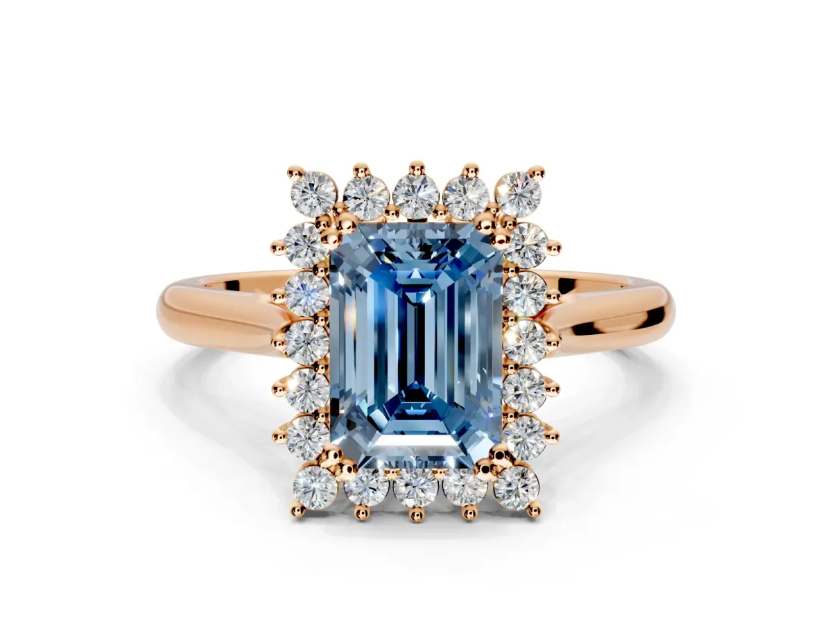 Starburst Halo Engagement Ring Setting for Fancy Blue Emerald Cut Center with Thin Round-Wire Band and Prong Head in Rose Gold