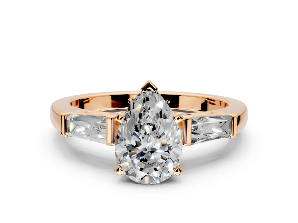 3 Stone Engagement Ring Setting for Pear-Shaped Center with Tapered Baguettes, Plain Band and Prong Head in Rose Gold