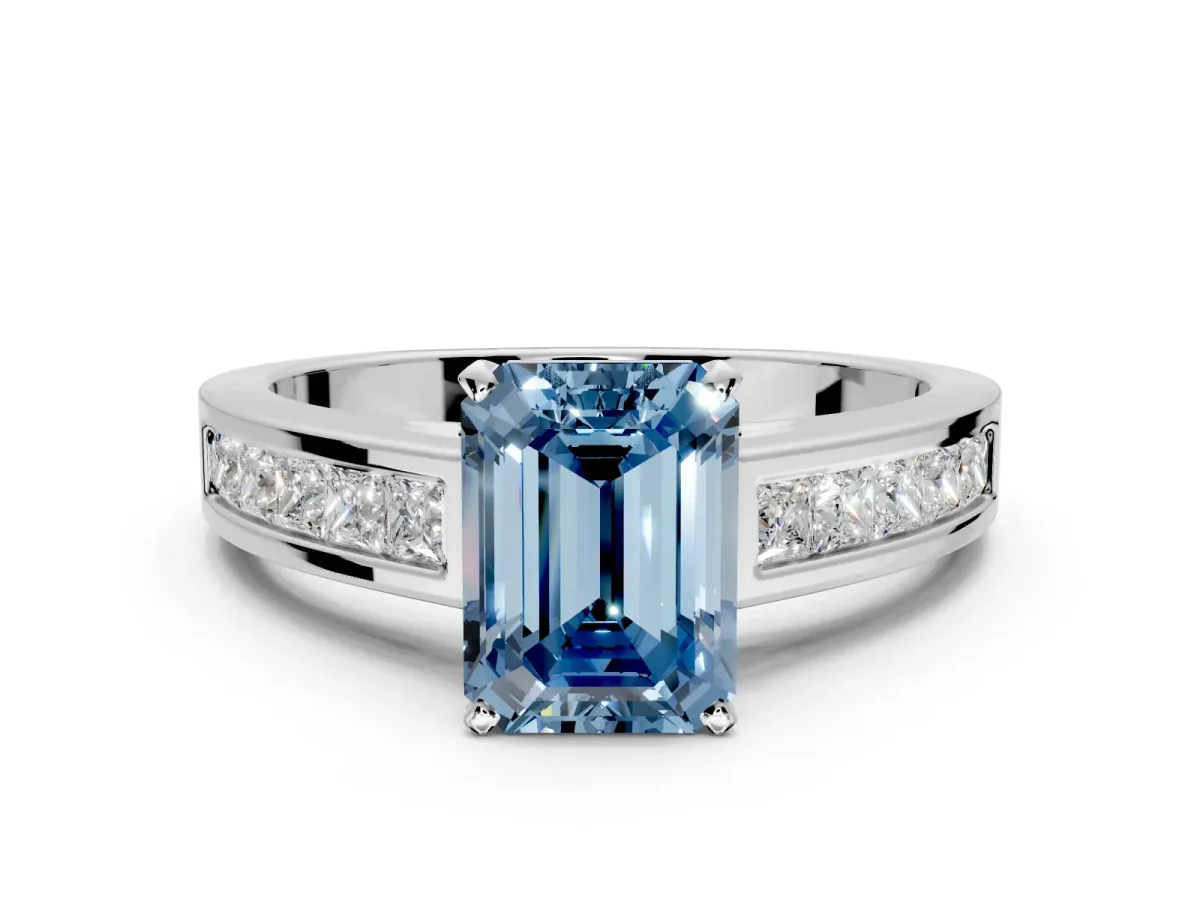 Solitaire Engagement Ring Setting for Fancy Blue Emerald Cut Center with Princess Cut Channel Band and Prong Head in Sterling Silver