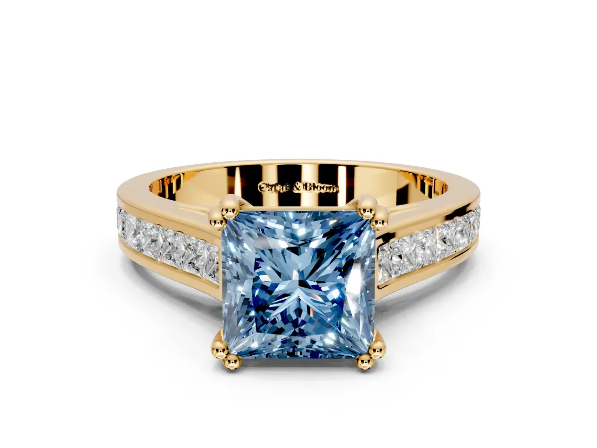 Solitaire Engagement Ring Setting for Fancy Blue Princess Cut Center with Channel Band and Double Claw Prong Head in Yellow Gold