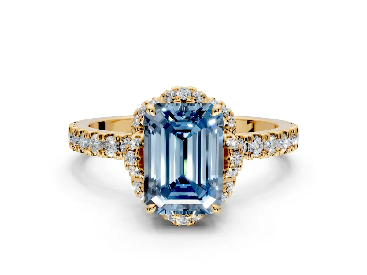 Halo Engagement Ring Setting for Fancy Blue Emerald Cut Center with Openwork Halo, Pave Band and Prong Head in Yellow Gold