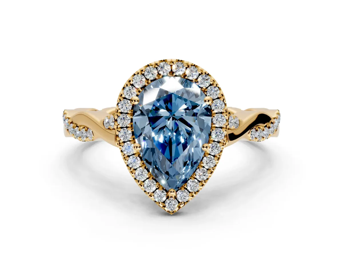 Halo Engagement Ring Setting for Fancy Blue Pear-Shaped Center with Twist Band and Prong Head in Yellow Gold