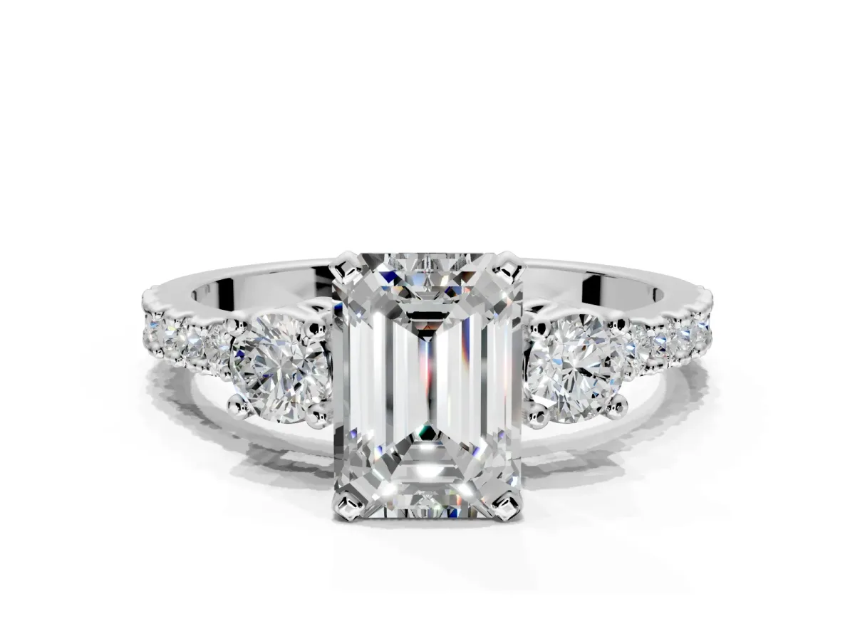 3 Stone Engagement Ring Setting for Emerald Cut Center with Round Cut Side Accents and Prong Head in Platinum