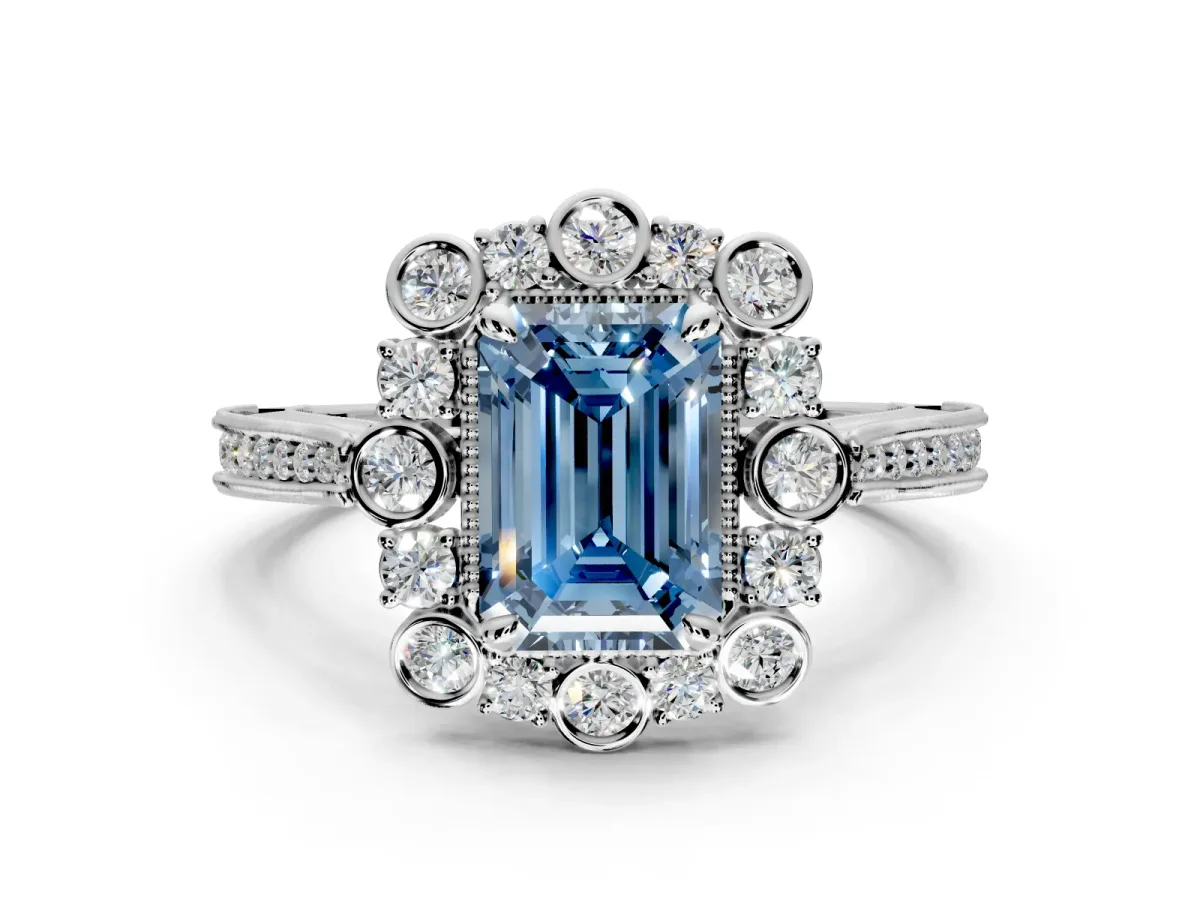 Milgrain Halo Engagement Ring Setting for Fancy Blue Emerald Cut Center with Bezel Point Accents and Prong Head in Platinum