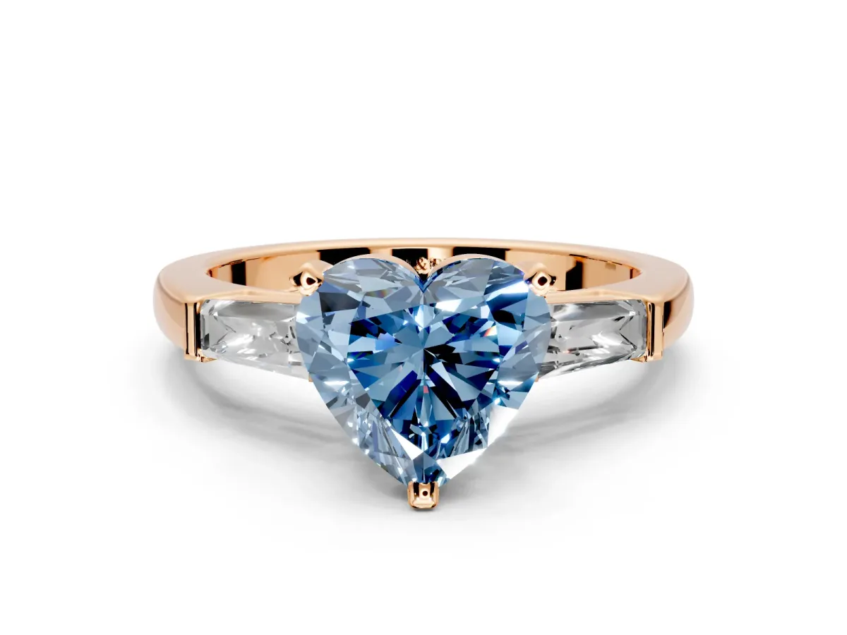 3 Stone Engagement Ring Setting for Fancy Blue Heart-Shaped Center with Tapered Baguettes, Plain Band and Prong Head in Rose Gold
