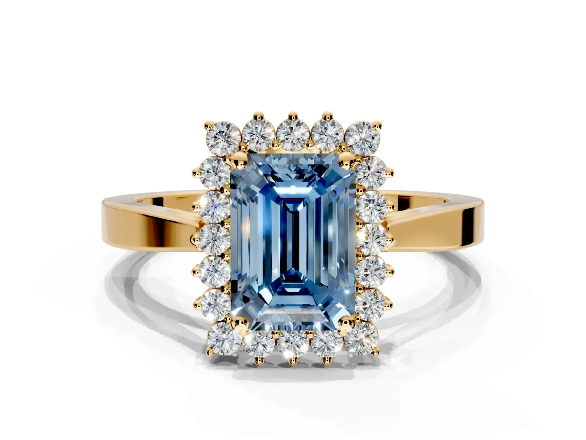 Starburst Halo Engagement Ring Setting for Fancy Blue Emerald Cut Center with Flat Cathedral Band and Prong Head in Yellow Gold
