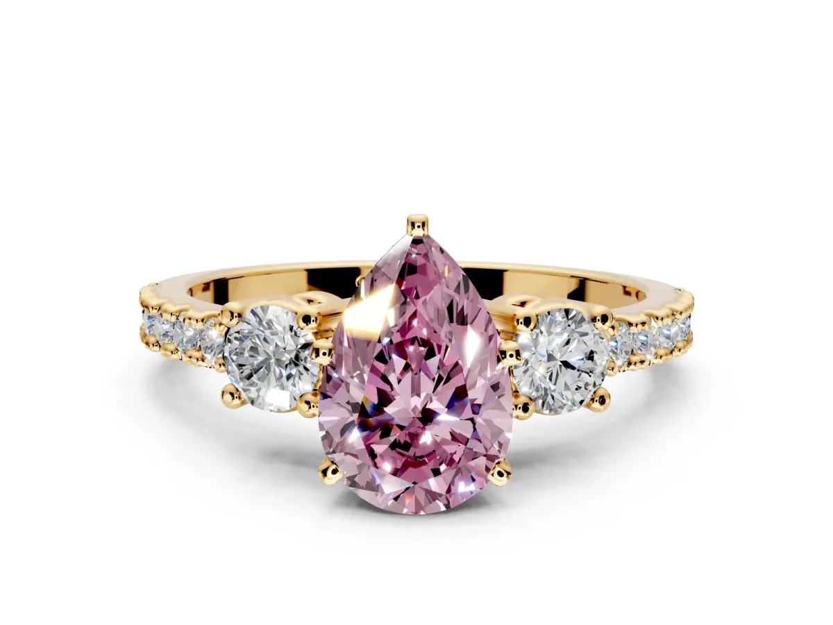 3 Stone Engagement Ring Setting for Fancy Pink Pear-Shaped Center with Round Cut Side Accents and Prong Head in Yellow Gold
