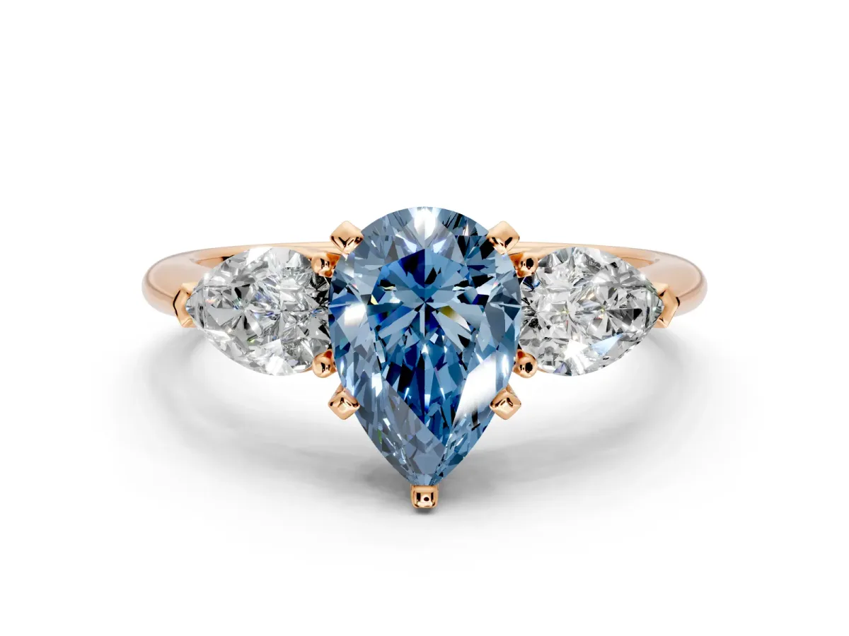 3 Stone Engagement Ring Setting for Fancy Blue Pear-Shaped Center with Large Pear-Shaped Accents and Prong Head in Rose Gold