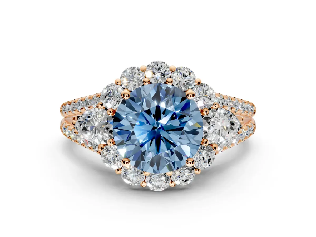 Halo Engagement Ring Setting for Fancy Blue Round Cut Center with Two-Strand Split Shank and Prong Head in Rose Gold